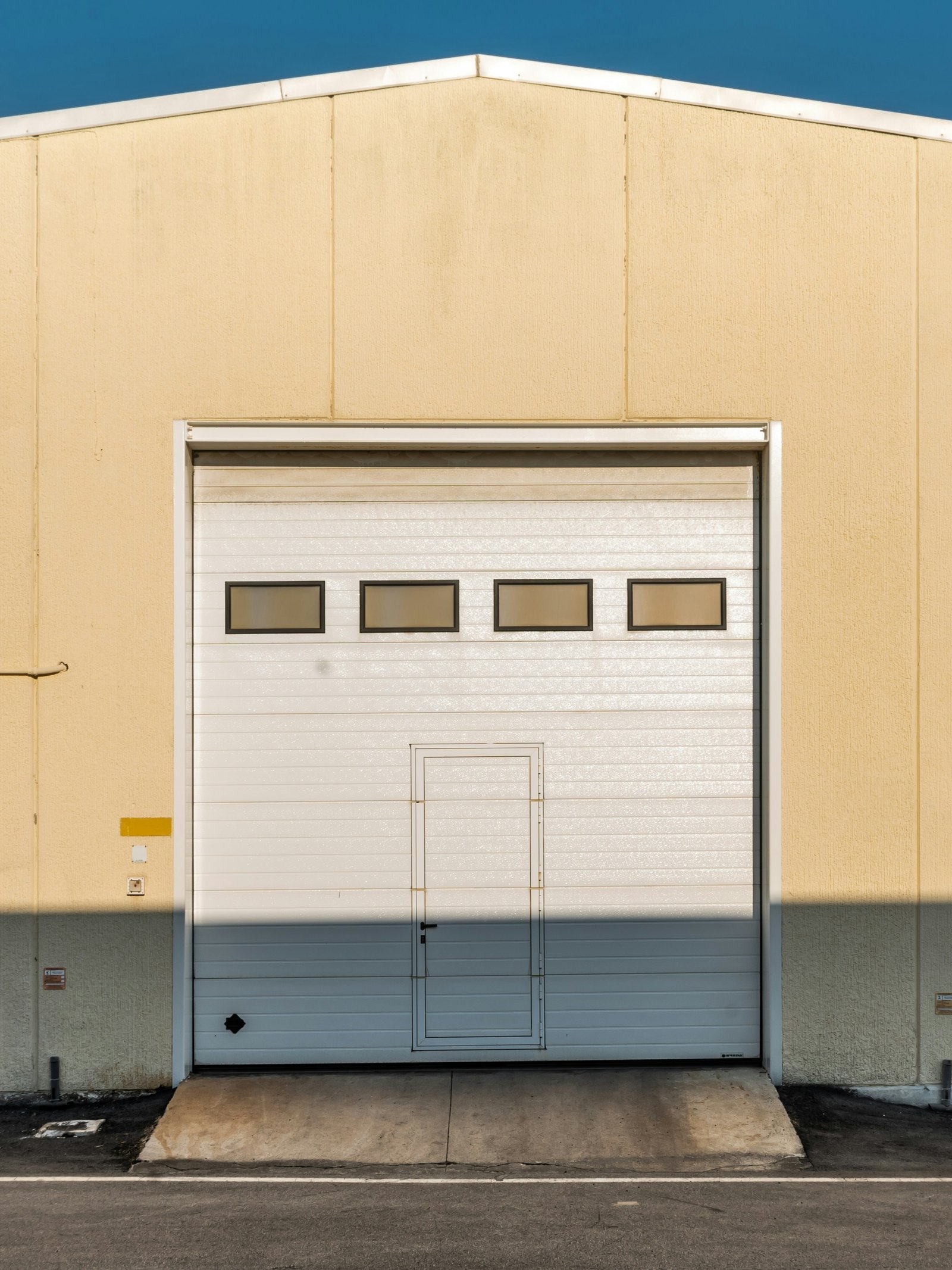 A well-maintained garage door with visible parts
