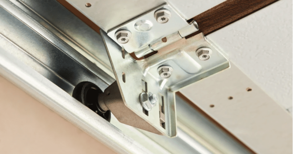 how to replace garage door rollers without bending track